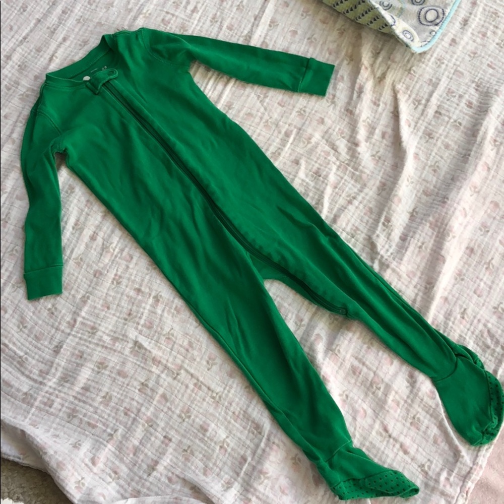 Green Primary footie pajamas.